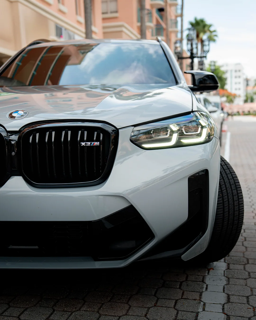 BMW X3 M grille and headlight fit and finish after repair, Boca Raton